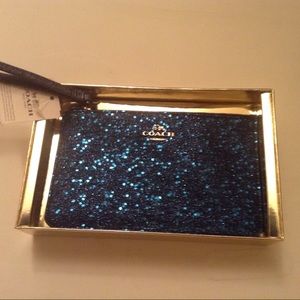 Blue sparkle Coach wristlet NWT